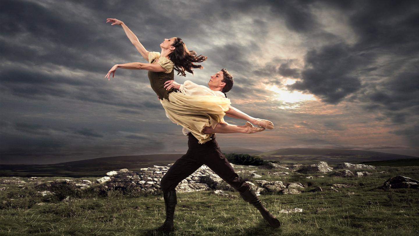 Heathcliff lifts Cathy on the moors on our poster for Wuthering Heights.
