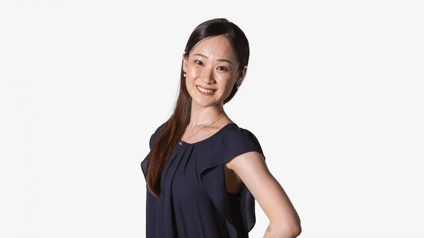 Headshot of a female dancer in a black top