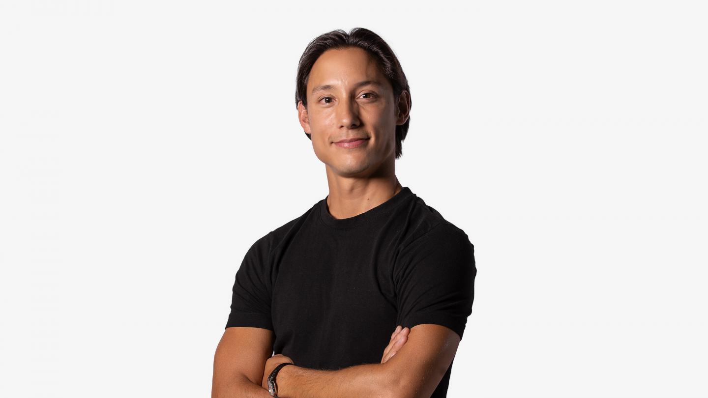 Headshot of a male dancer in a black t-shirt