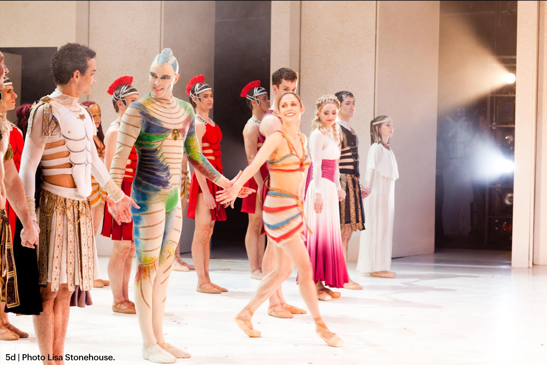 Dancers smiling at a curtain call