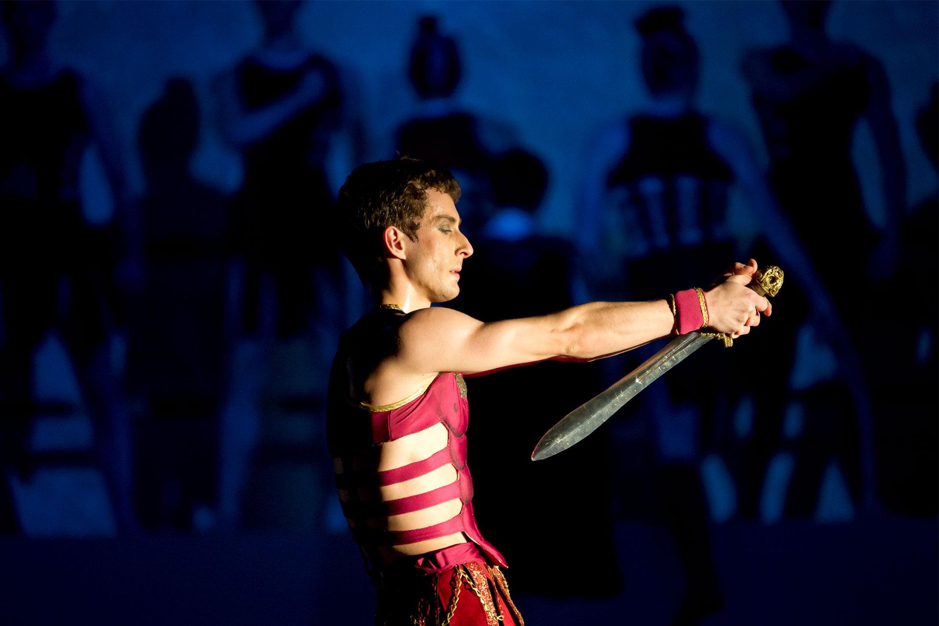 Cleopatra, production, 2011, Tobias Batley, Mark Antony, photo Bill Cooper Mark Antony prepares to stab himself with his sword