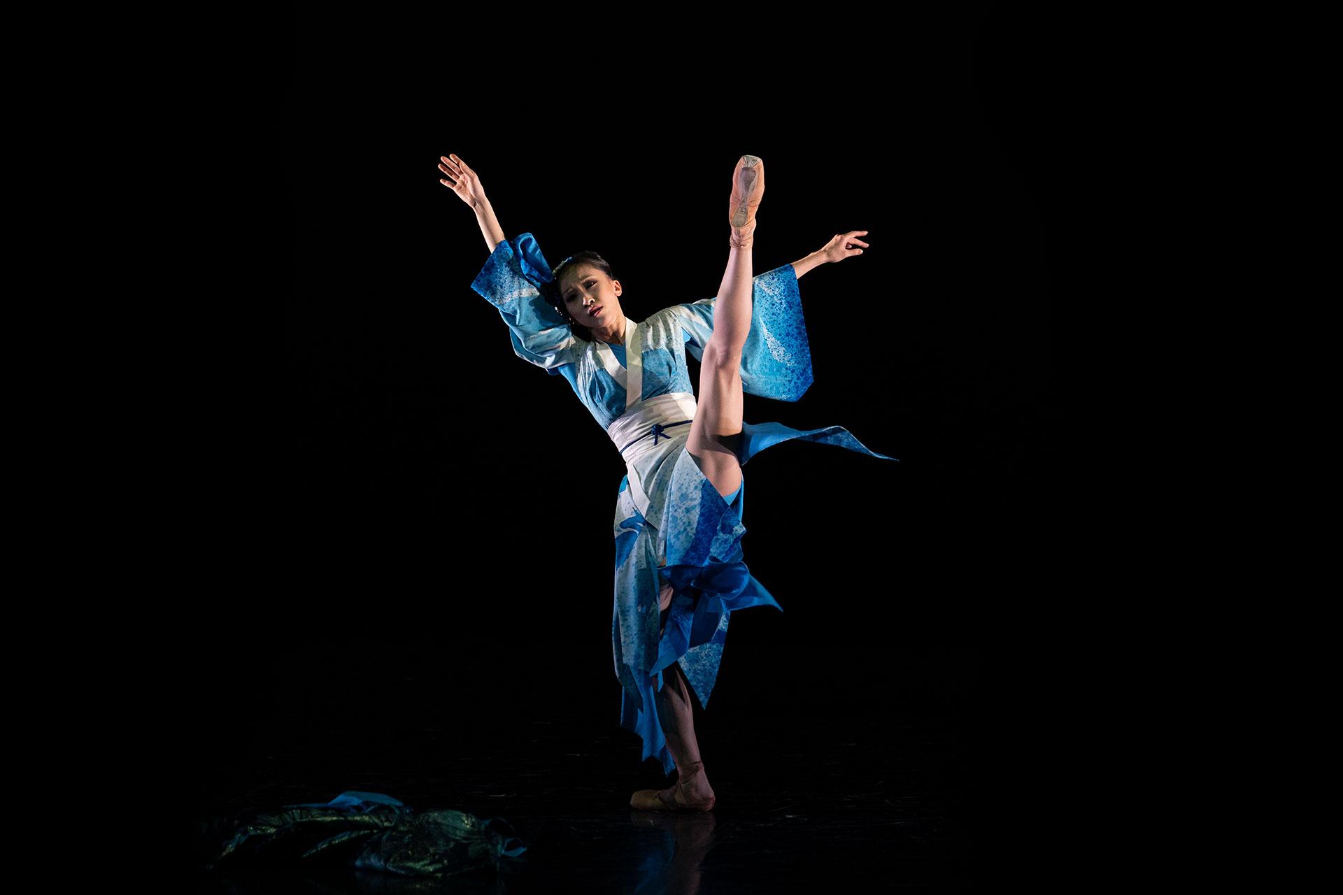 Okichi is conflicted wearing her blue Geisha kimono