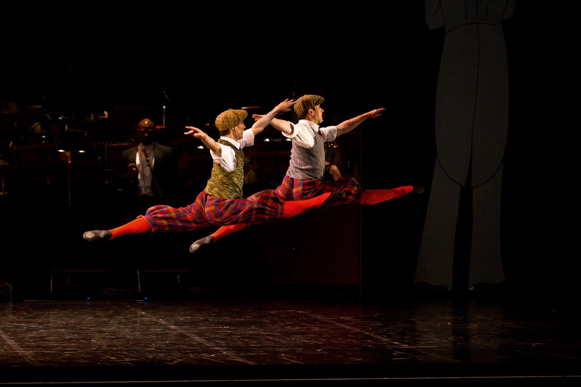 I Got Rhythm, production, 2012, Kevin Poeung and Benjamin Mitchell, photo Emma Kauldhar Dressed in flat caps and knickerbockers, Kevin Poeung and Benjamin Mitchell leap away from the camera