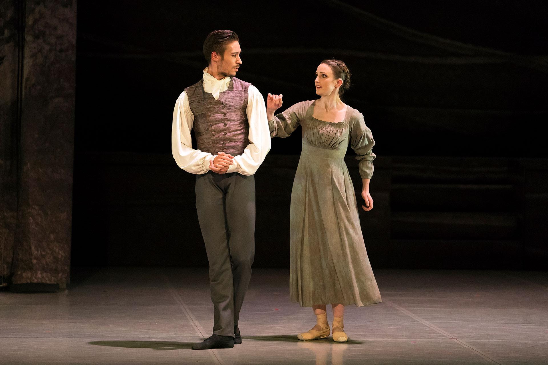 Jane Eyre reaches for Rochester's arm