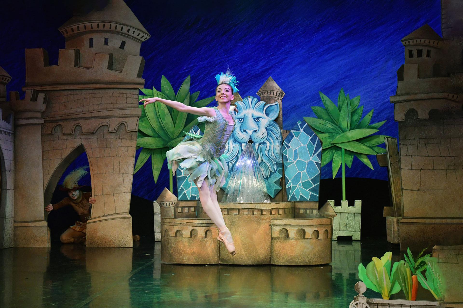 Little Bird flits in front of the fountain