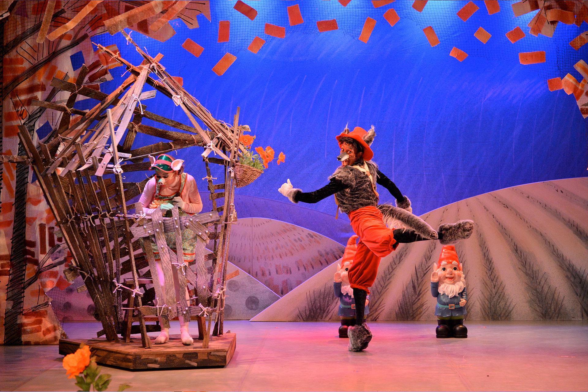 Wolf stalks around the house of sticks