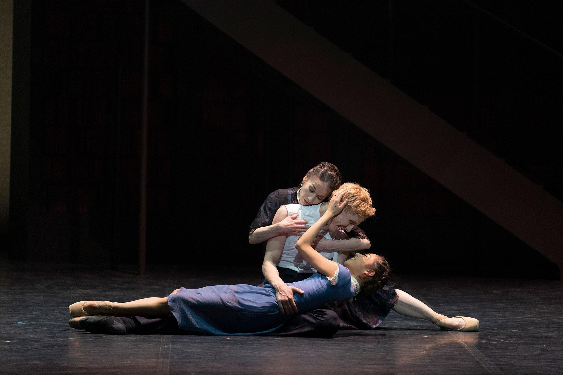 Victoria, production, 2019, Pippa Moore, Sean Bates and Miki Akuta, older Beatrice, Liko, young Beatrice, photo Emma Kauldhar PRincess Beatrice clasps the memory of Liko holding her in his arms