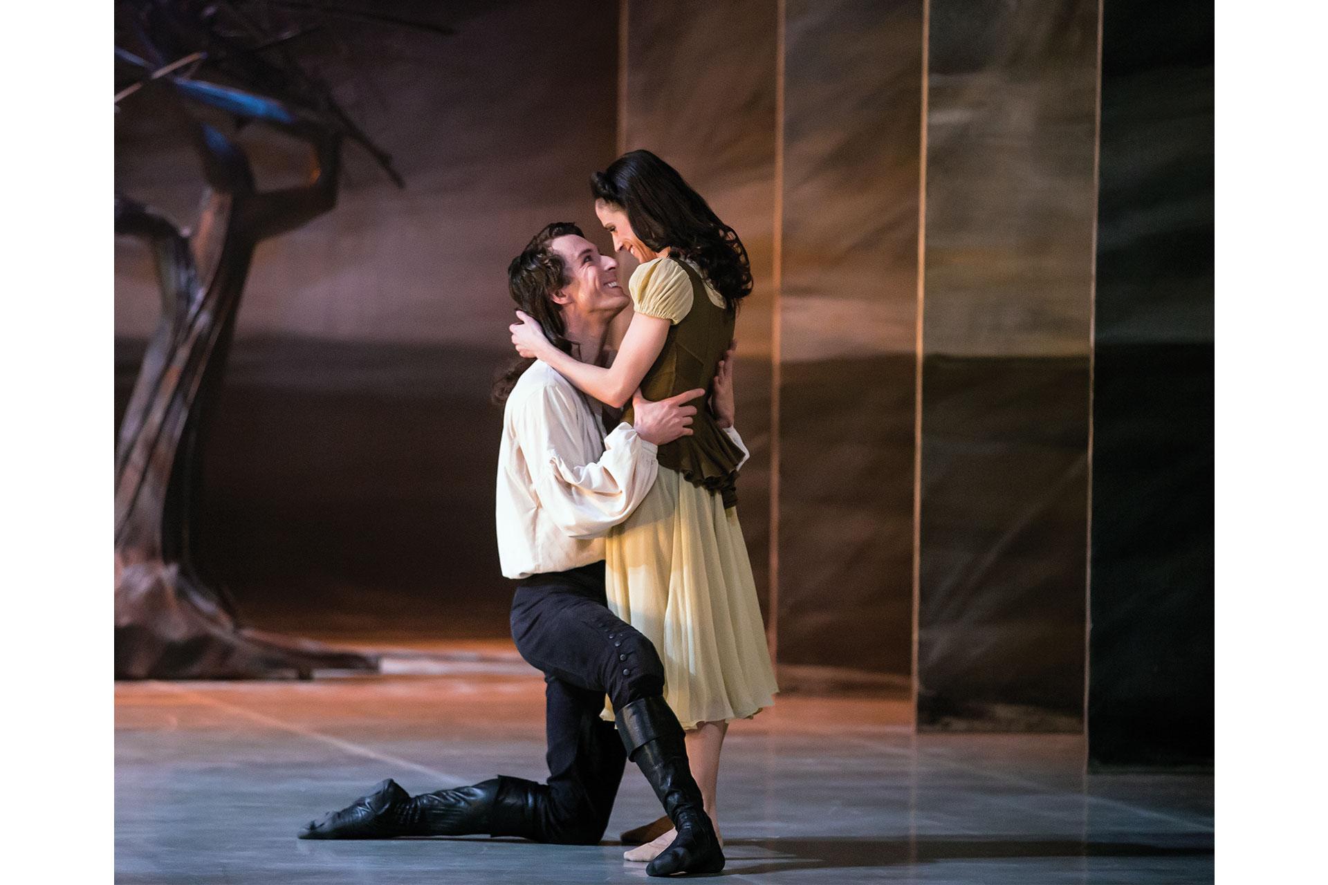 Wuthering Heights, production, 2015, Martha Leebolt as Cathy and Tobias Batley as Heathcliff, photo Emma Kauldhar Totally besotted in one another, Heathcliff kneels and holds Cathy close