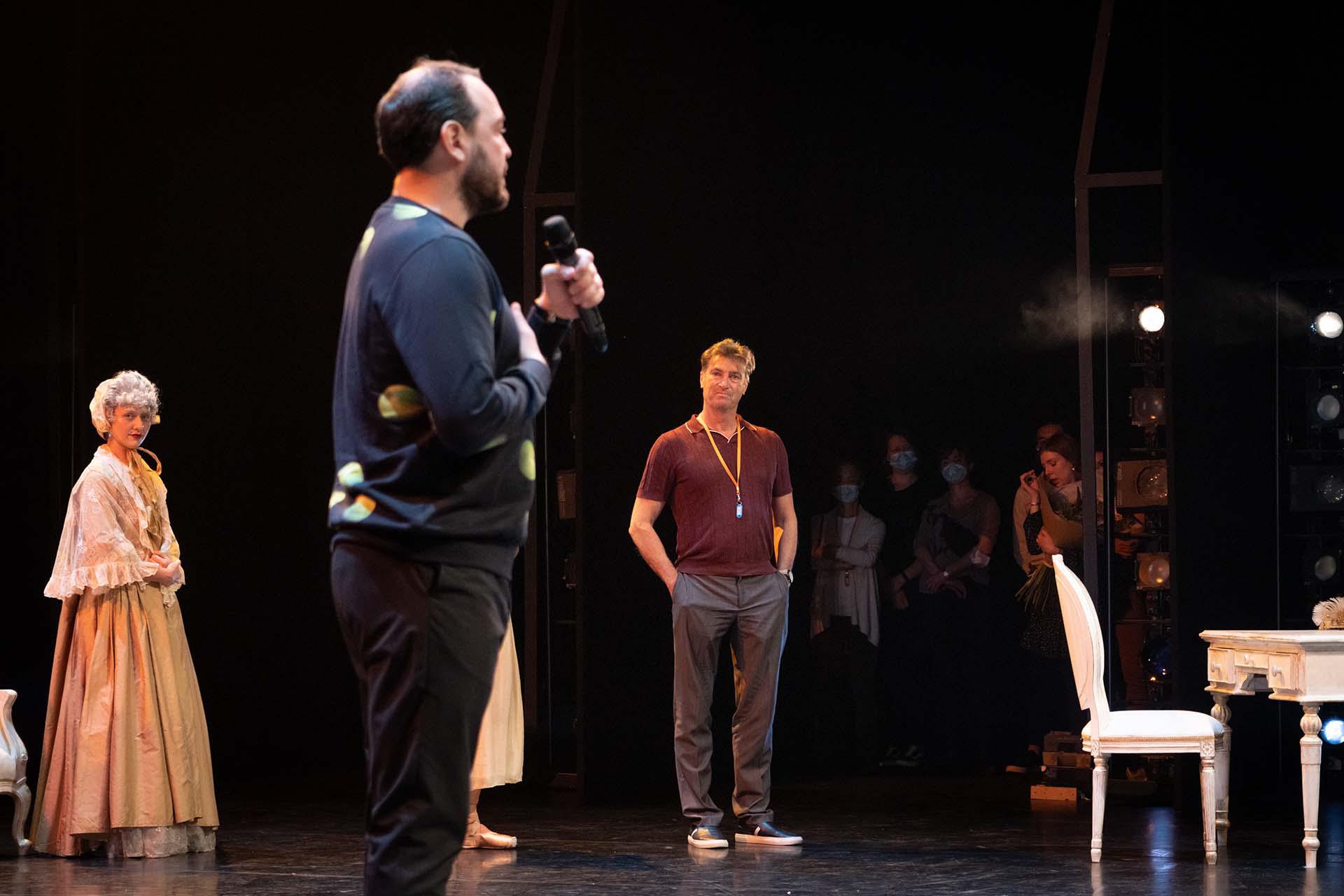 David Nixon looks on at Kenneth Tindall as he delivers a speech honouring him.