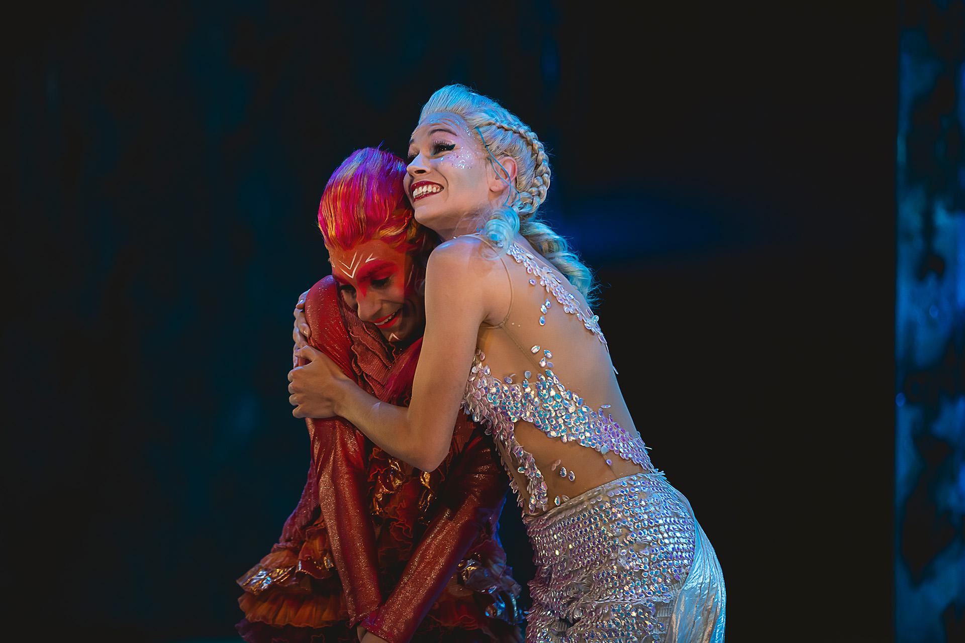 The Little Mermaid holds the seahorse shy Dillion with a smile