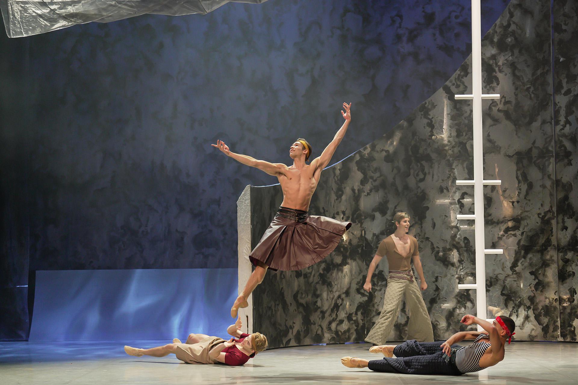 Wearing a leather kilt, Prince Adair leaps high on his ship