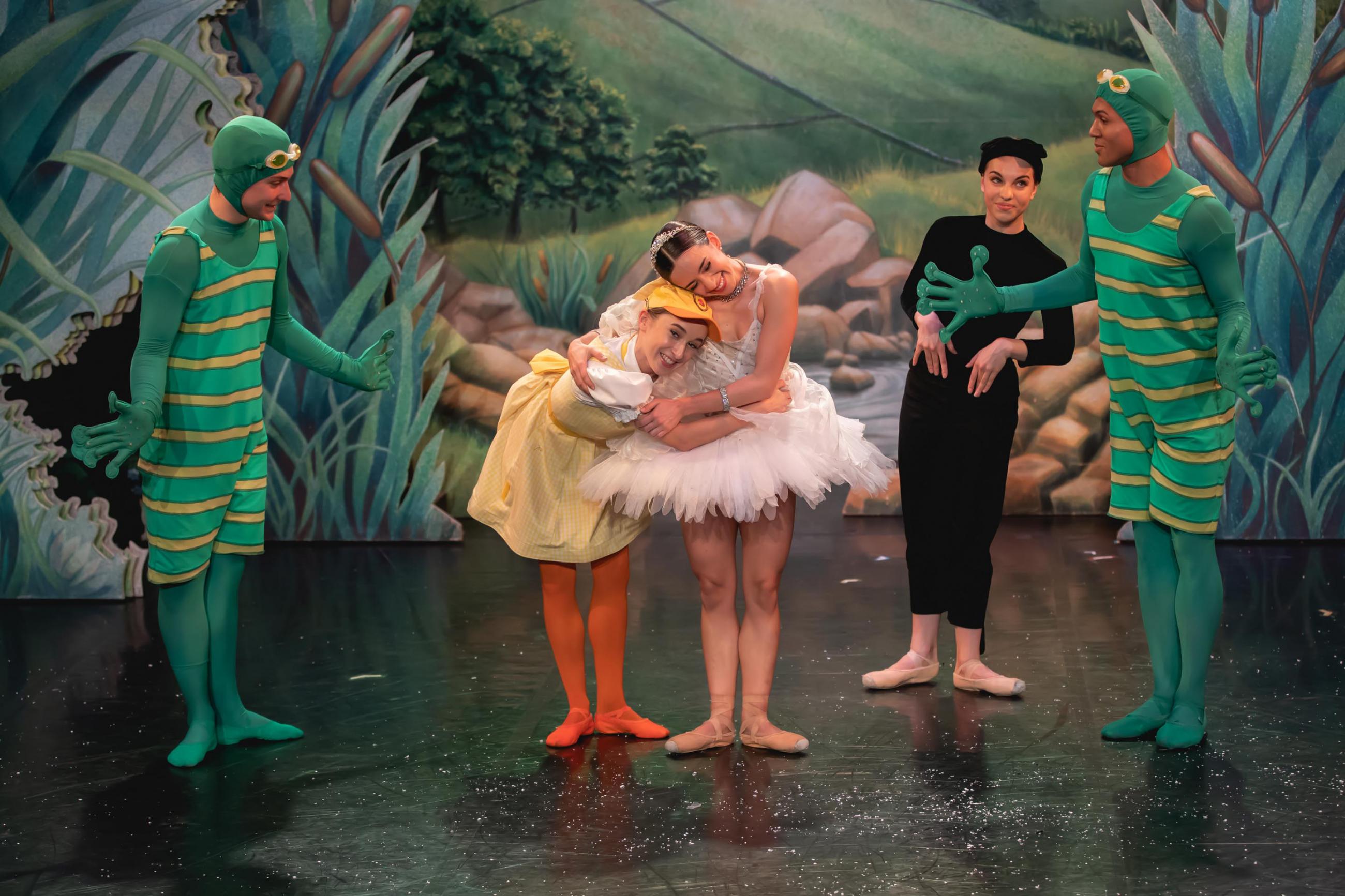 Dancers hugging in the centre of the photos