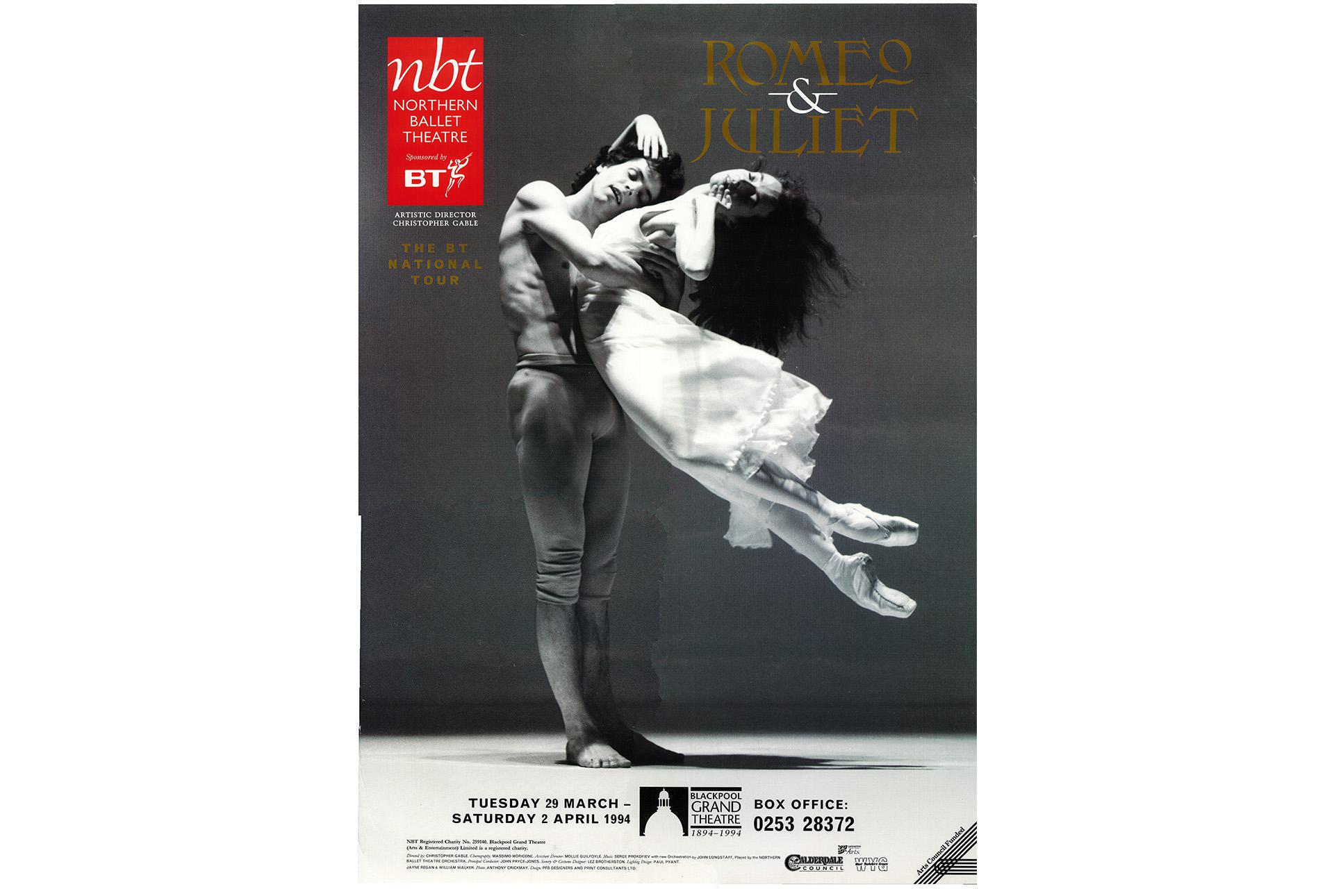 A black and white poster of two dancers in a loving embrace.