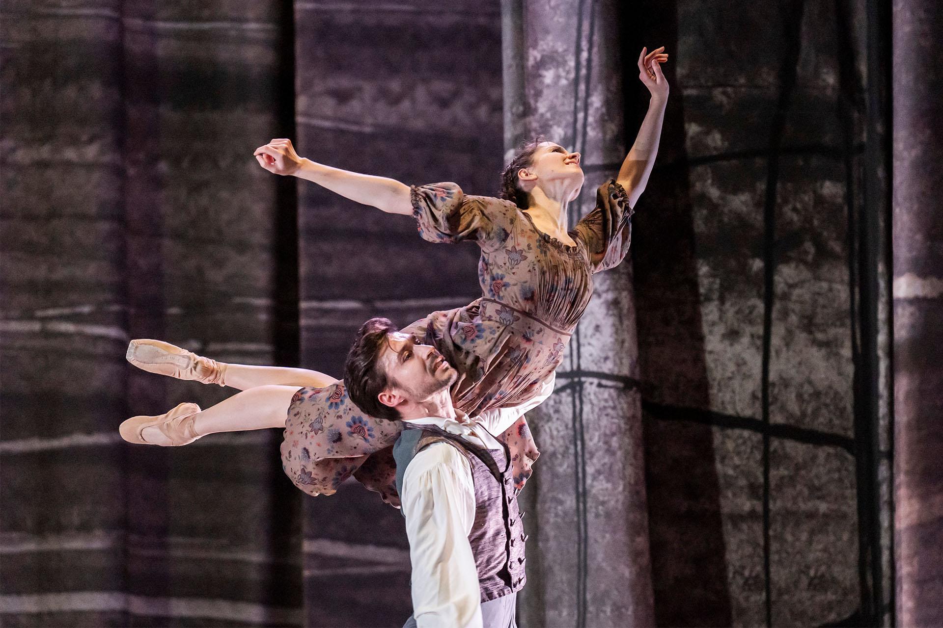 Jane Eyre, production, 2025, dancers Dominique Larose and Joseph Taylor. Photo Tristram Kenton Mr Rochester lifts Jane, she is on his shoulder, her legs pointed behind them, her back arched and her head thrown back in ecstacy