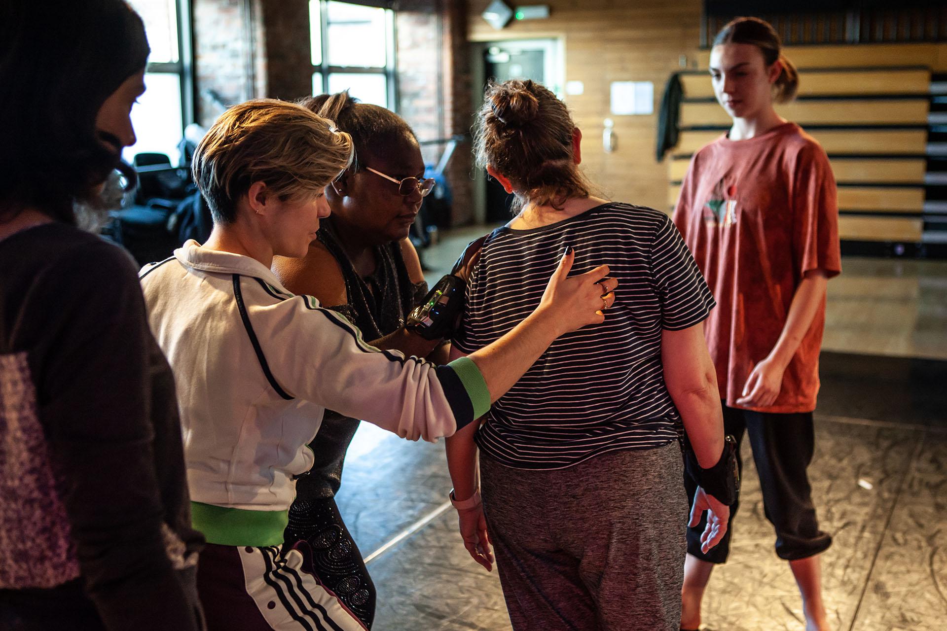 Learning, Expressions, Unbound Dance Theatre by Simon K. Allen Group rehearsing and practicing while physically supporting each other