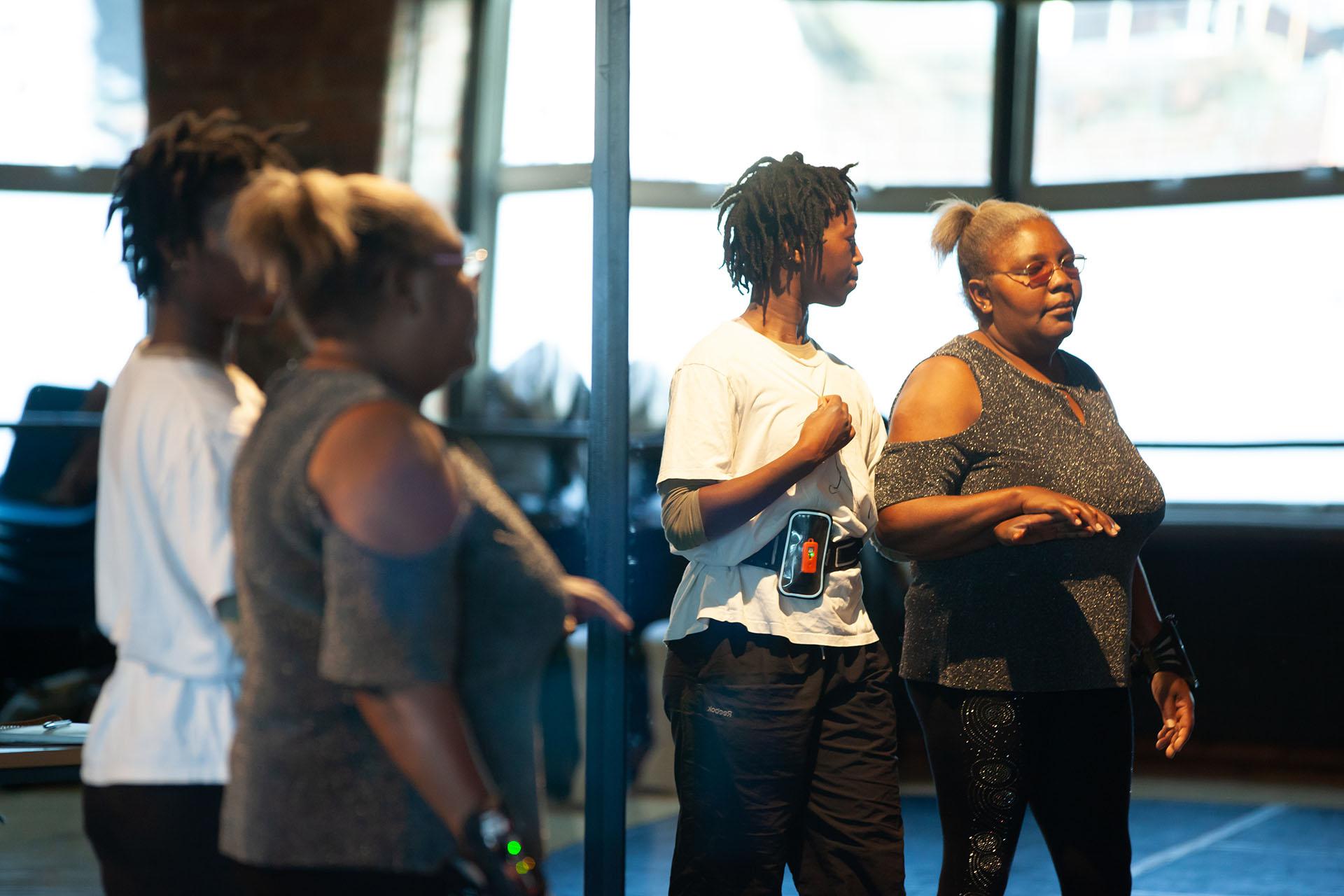 Learning, Expressions, Unbound Dance Theatre by Simon K. Allen Reflection of two people in a mirror