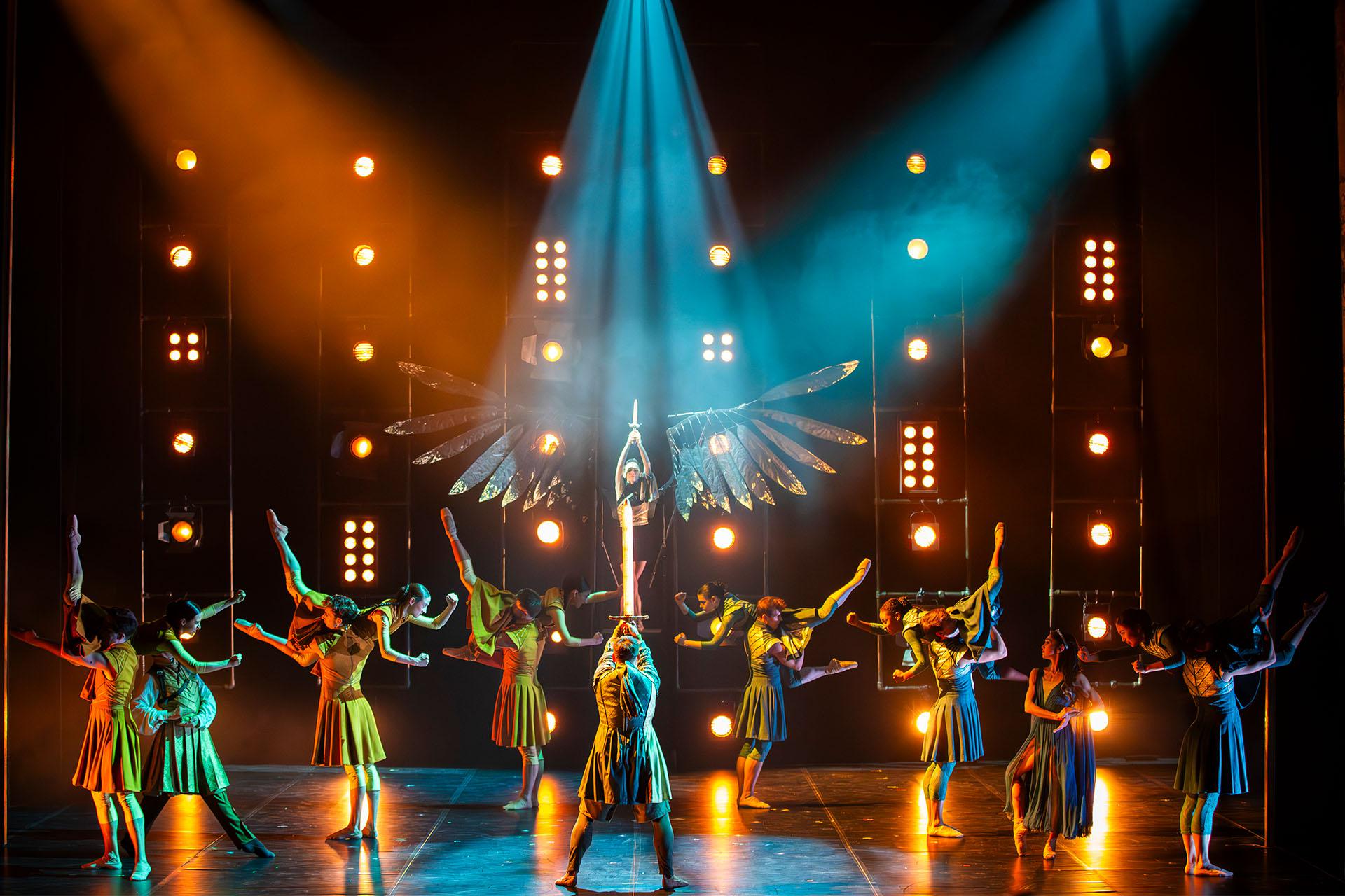 Merlin holds the glowing sword high against Morgan's magicks, Morgan stands, her dark wings spread behind her holding a deadly dagger, between then the Kingdom is at war