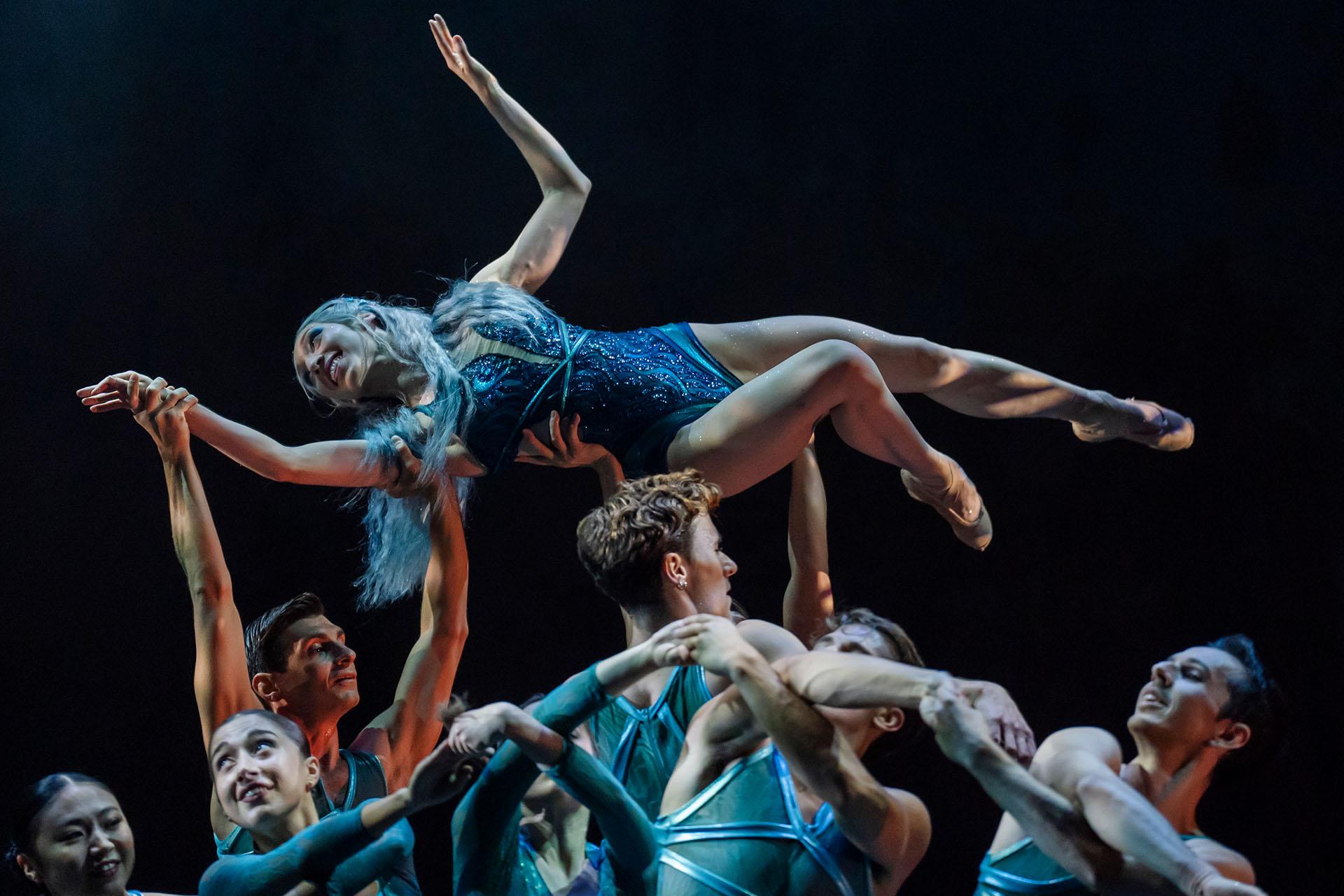 The Lady of the Lake lifted by the waters (represented by dancers)