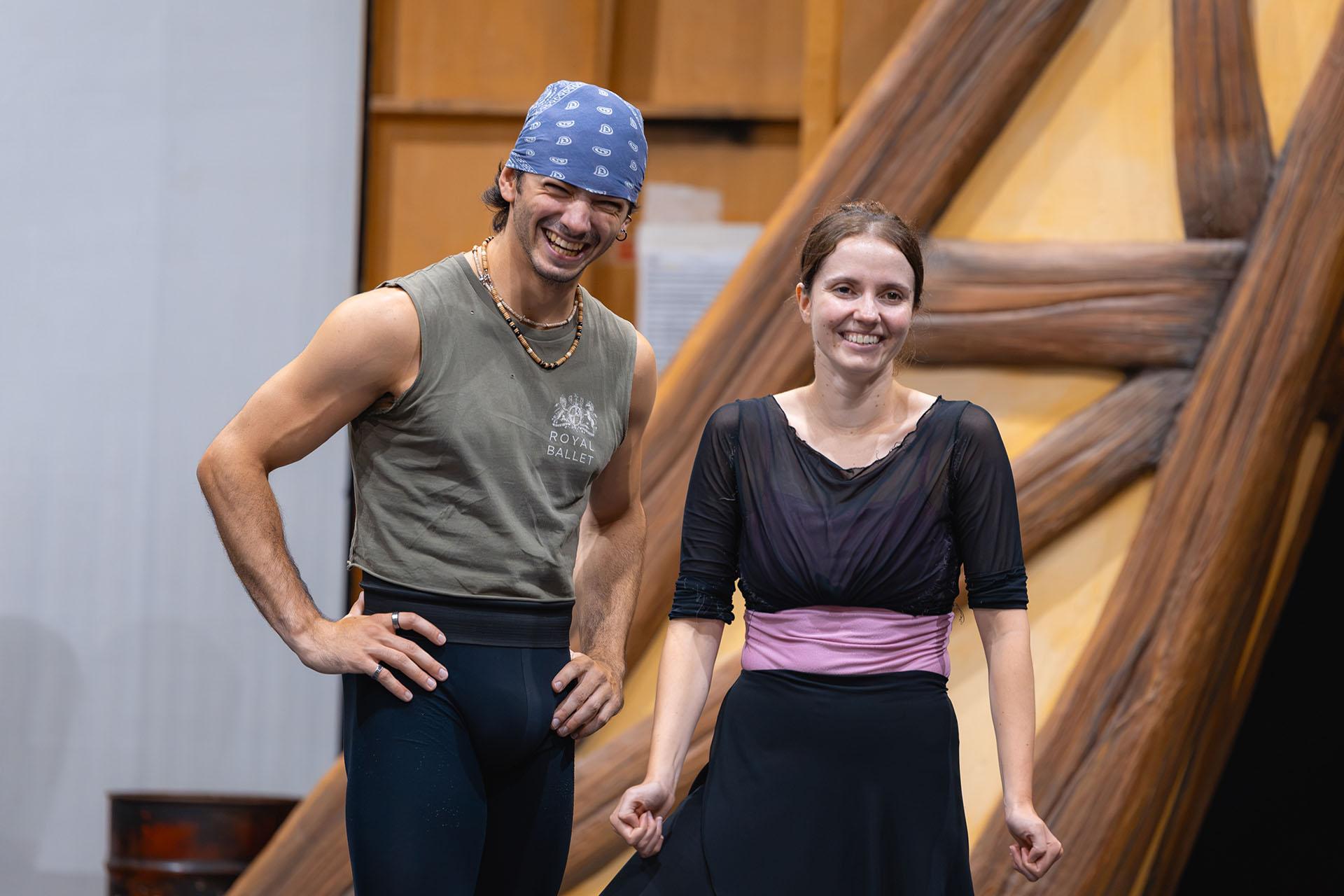 Two dancer in rehearsal laughing
