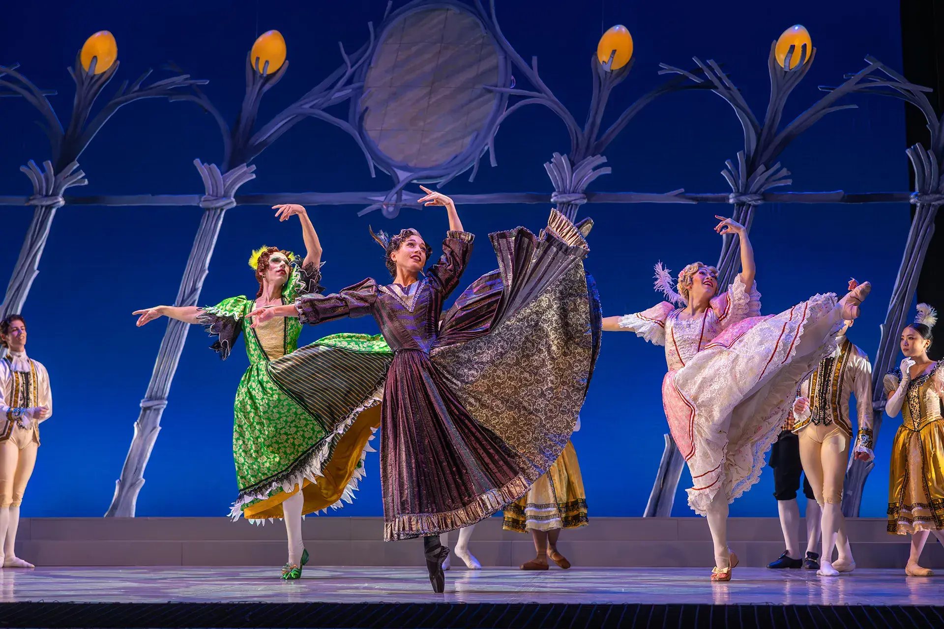 Cinderella's step-mother and step sisters in their dresses at the ball