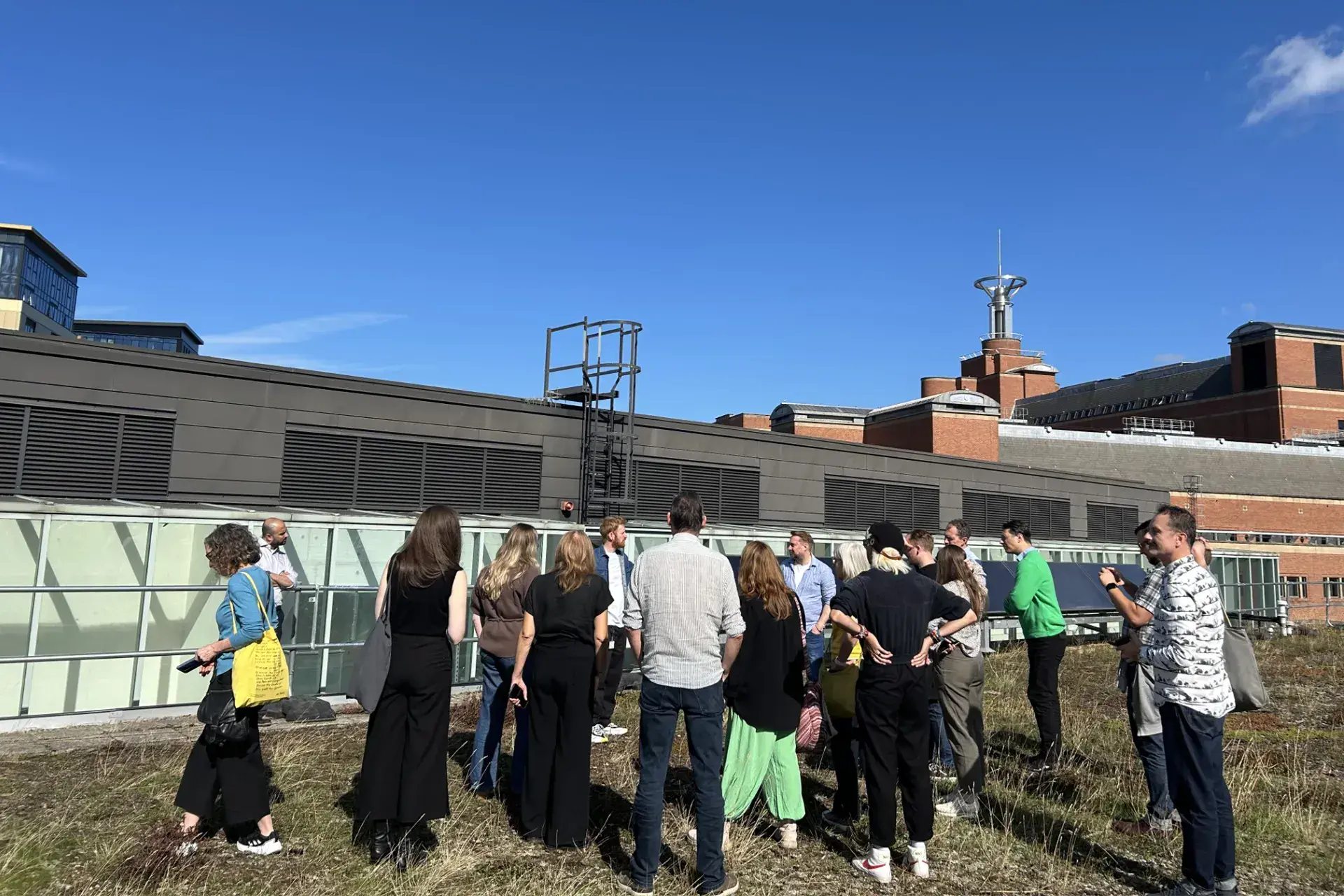 People on the roof of Northern Ballet's home leaning about plans for the future