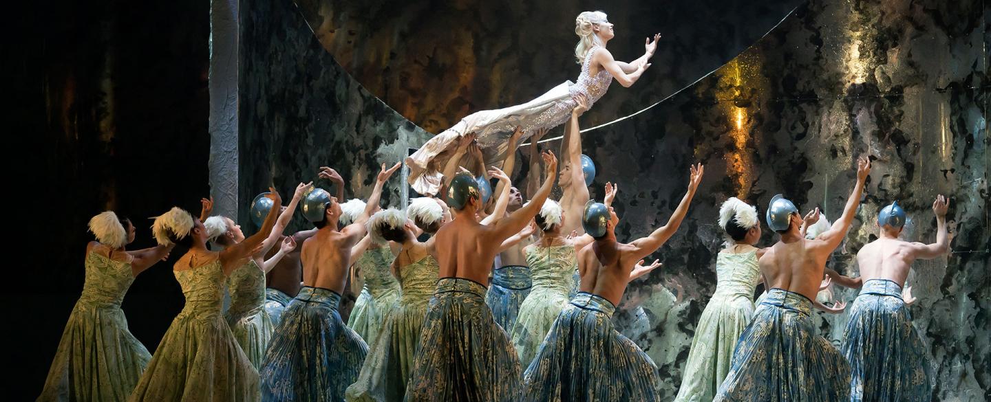 Abigail Prudames's Little Mermaid is lifted by an ocean of dancers. Photo Emma Kauldhar.