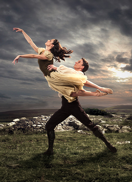 Heathcliff lifts Cathy on the moors on our poster for Wuthering Heights.