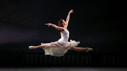 Cathy leaps and dances through the moors at night