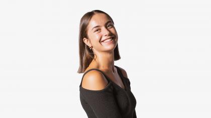 Headshot of a female dancer in a black top