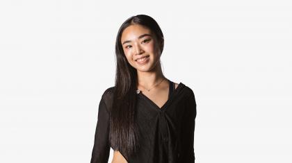 Headshot of a female dancer in a black top