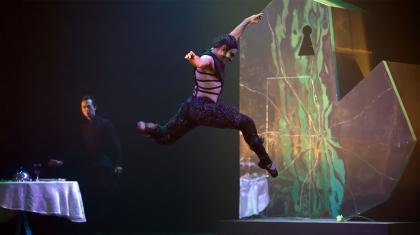 The Beast leaps high across the stage