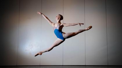 Woman leaping in a grand jete